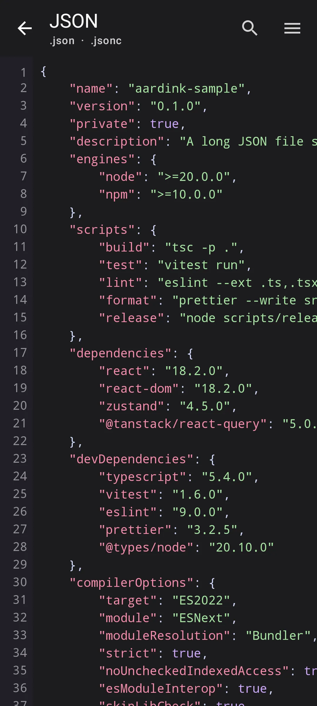 Aardink editor showing JSON in the Material Dark theme